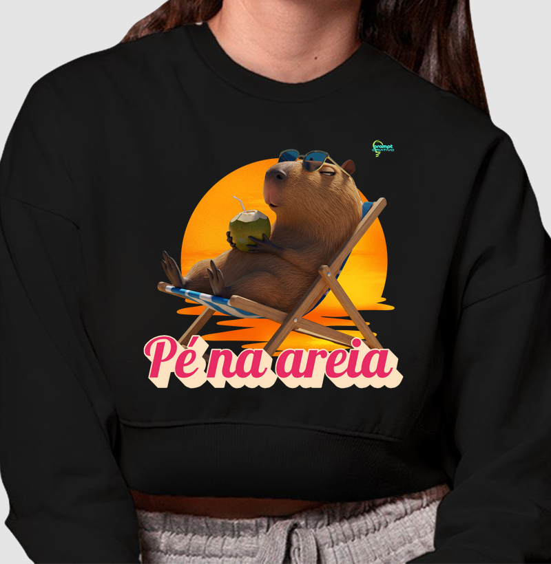Capivara pé na areia