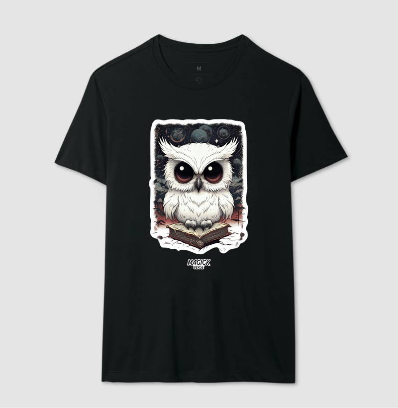 White owl sitting on a book