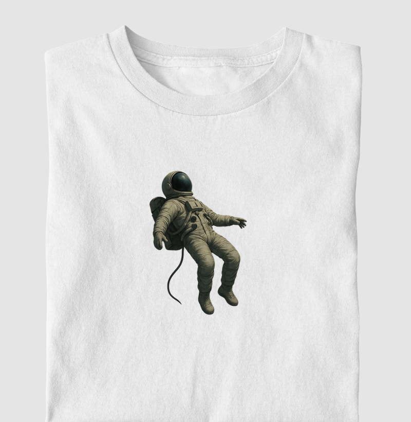 Camiseta Astronauta Flutuando – Leveza Cósmica