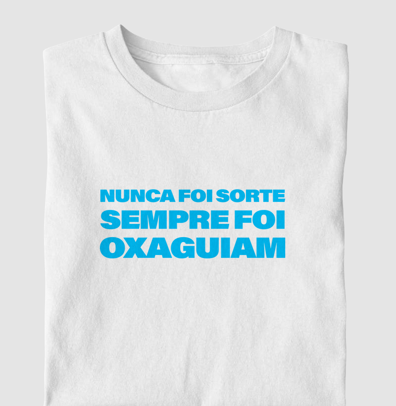 Camiseta ''Nunca Foi Sorte Sempre Foi Oxaguiam''